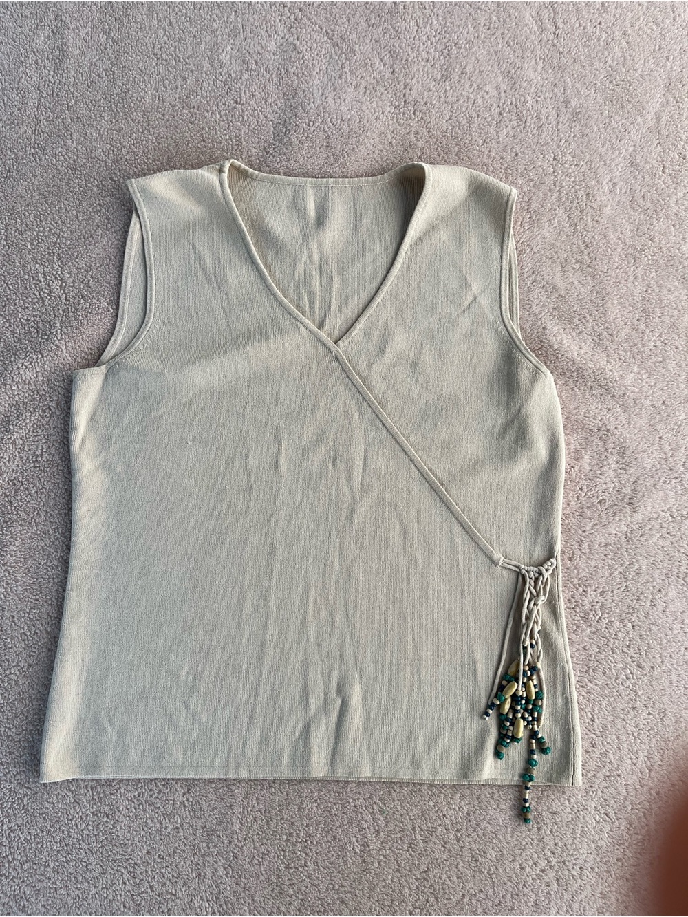 Sleeveless Wrap-Style Knit Top in Light Beige with Beaded Tie